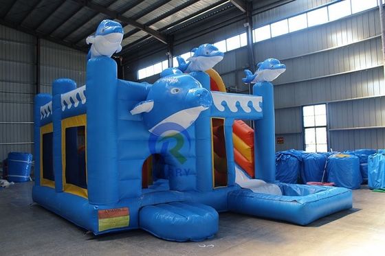Εξωτερική παιδική χαρά Unisex 5 * 5m Εμπορικό φουσκωτό δελφίνι αναπηδικό σπίτι με διαδρόμιο